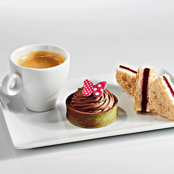 Café gourmand : coffee with delicacies and desserts Stock Photo